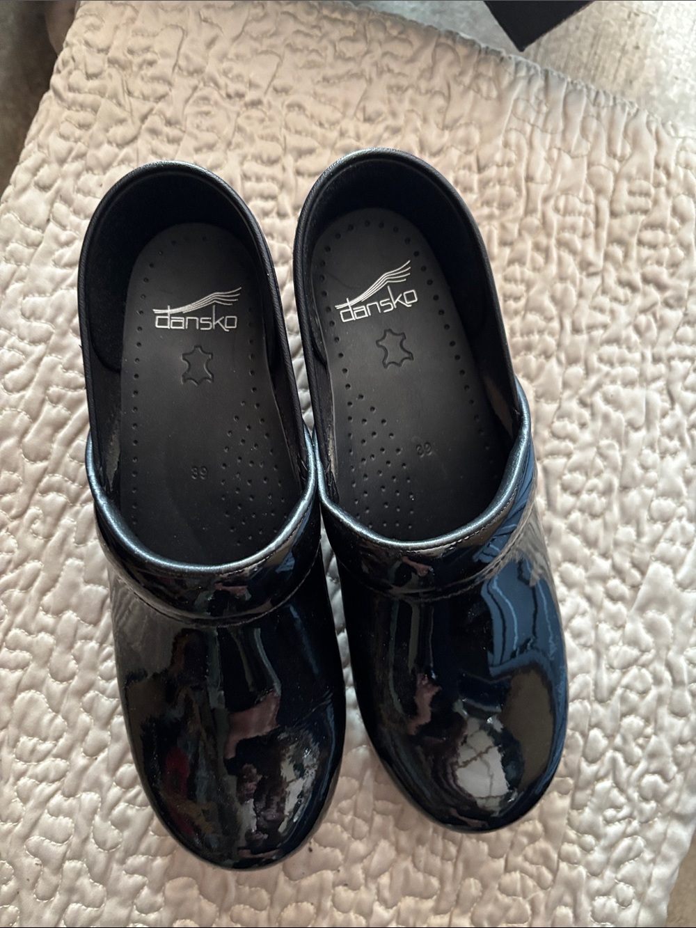 Dansko Women’s Black Patent Clogs